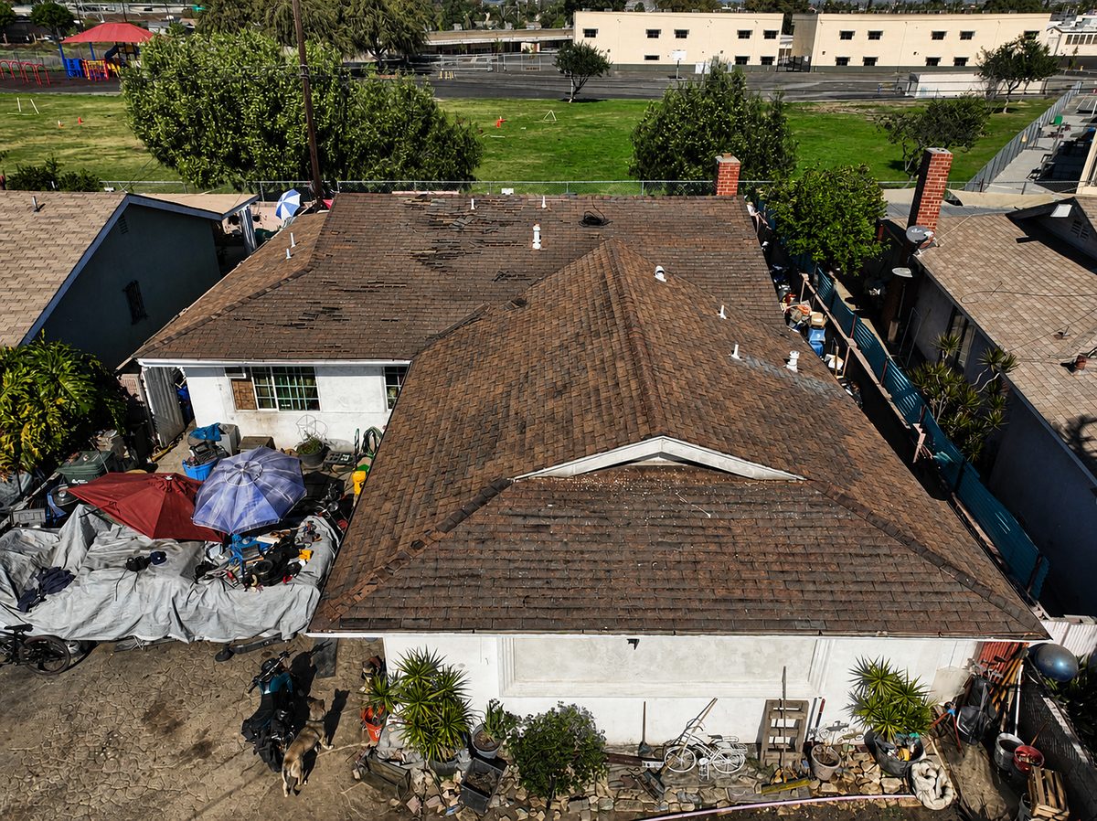 Before: Worn asphalt roof in Bell Gardens