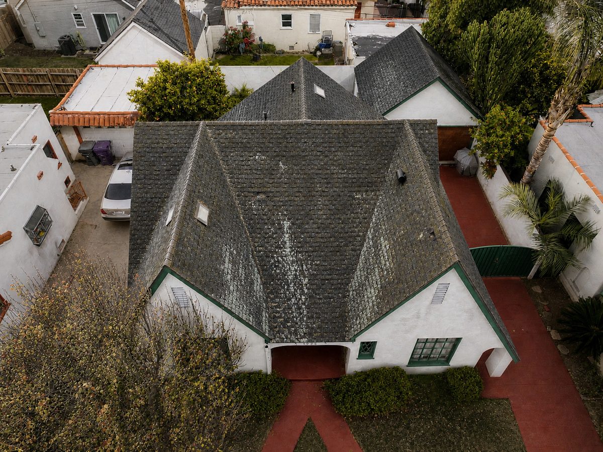 Before: Worn steep-pitch roof in Long Beach
