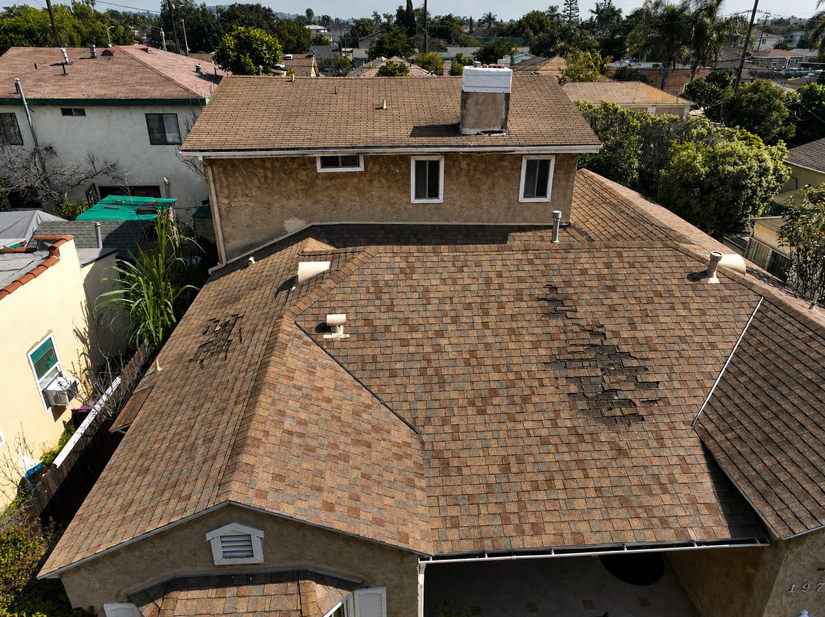 Before: Old roof with chimney in Long Beach