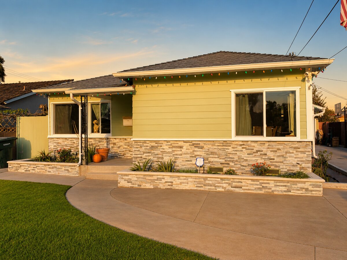 After: Windows + repaint + stacked stone in Bellflower