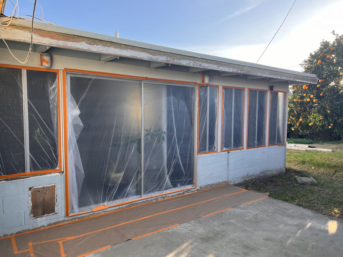 Masking and taping prep work before paint application